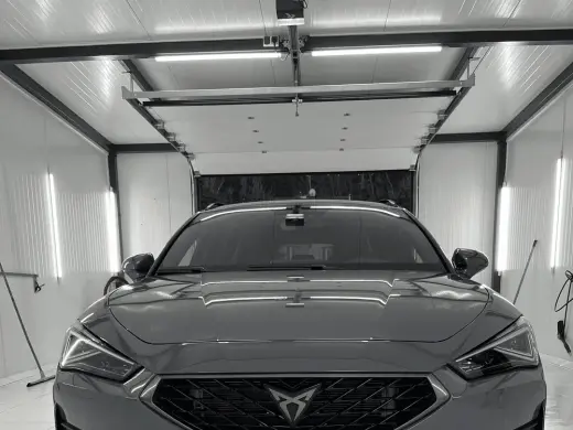 A black Cupra on the hand wash bay at Buddies studio